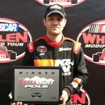 Bobby Santos III celebrates after winning the pole Saturday for Sunday's Spring Sizzler 200 at Stafford Speedway