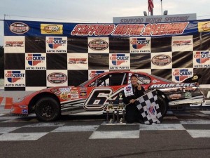 Austin Bessette celebrates his third Limited Late Model feature victory of the season Friday at Stafford Speedway (Photo: Stephanie Kimball/Stafford Speedway)